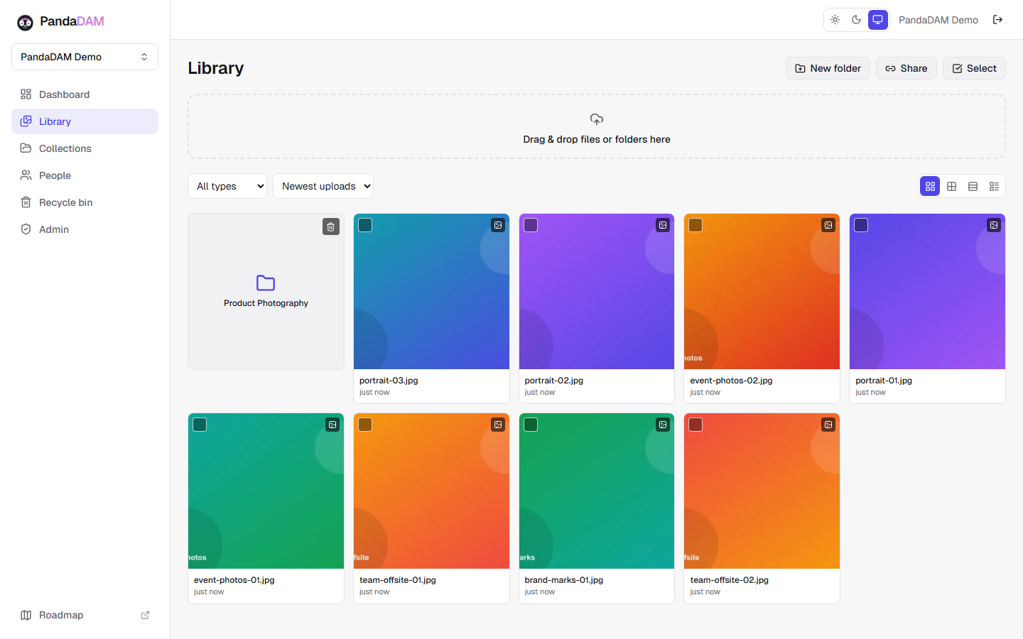 PandaDAM media library shown in grid view with folders and filters
