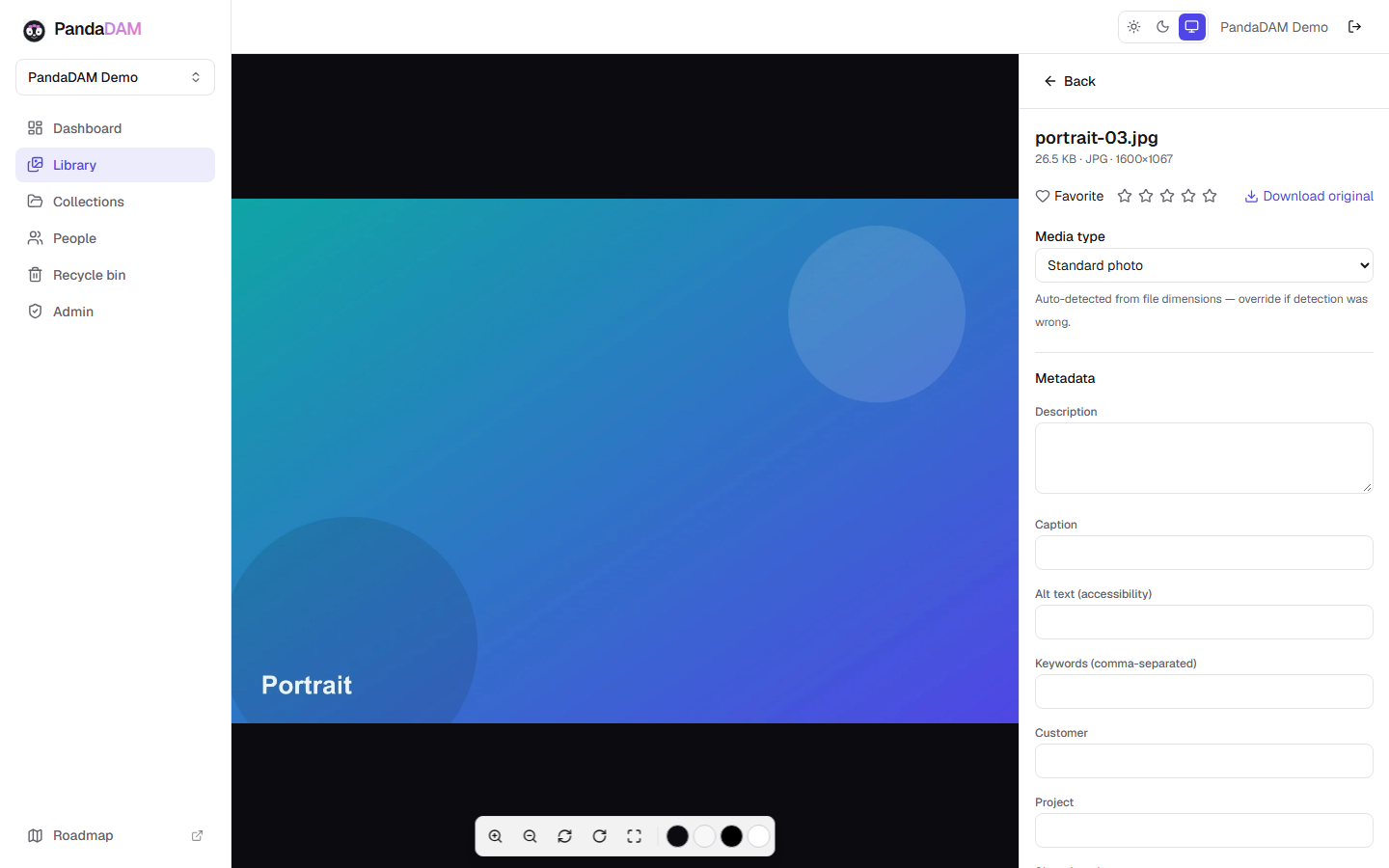 PandaDAM photo viewer with zoom, pan, rotate, and fullscreen controls open on a photo