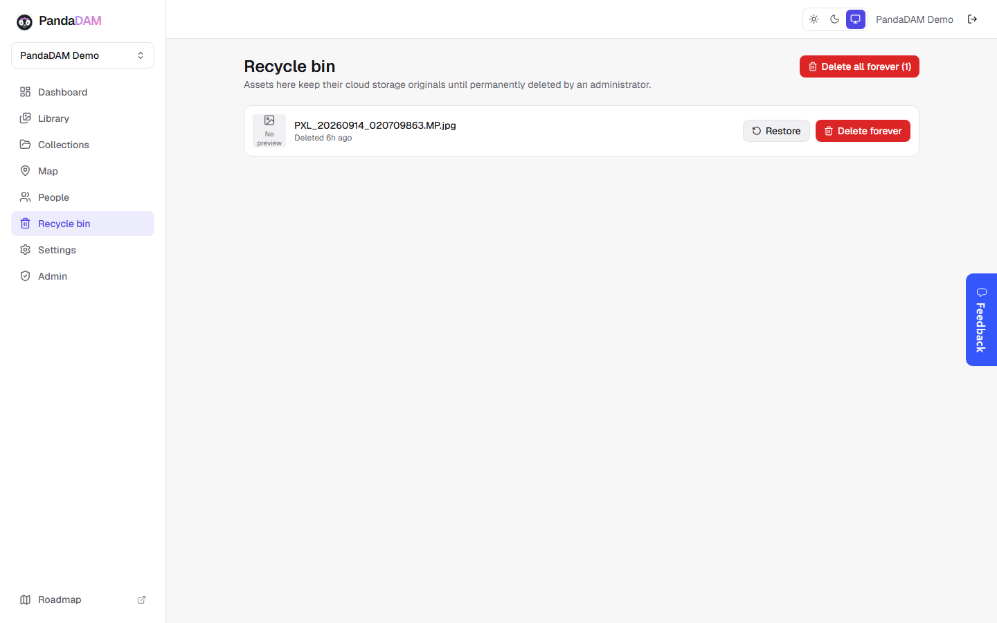 PandaDAM recycle bin showing a deleted asset with restore and permanent delete options